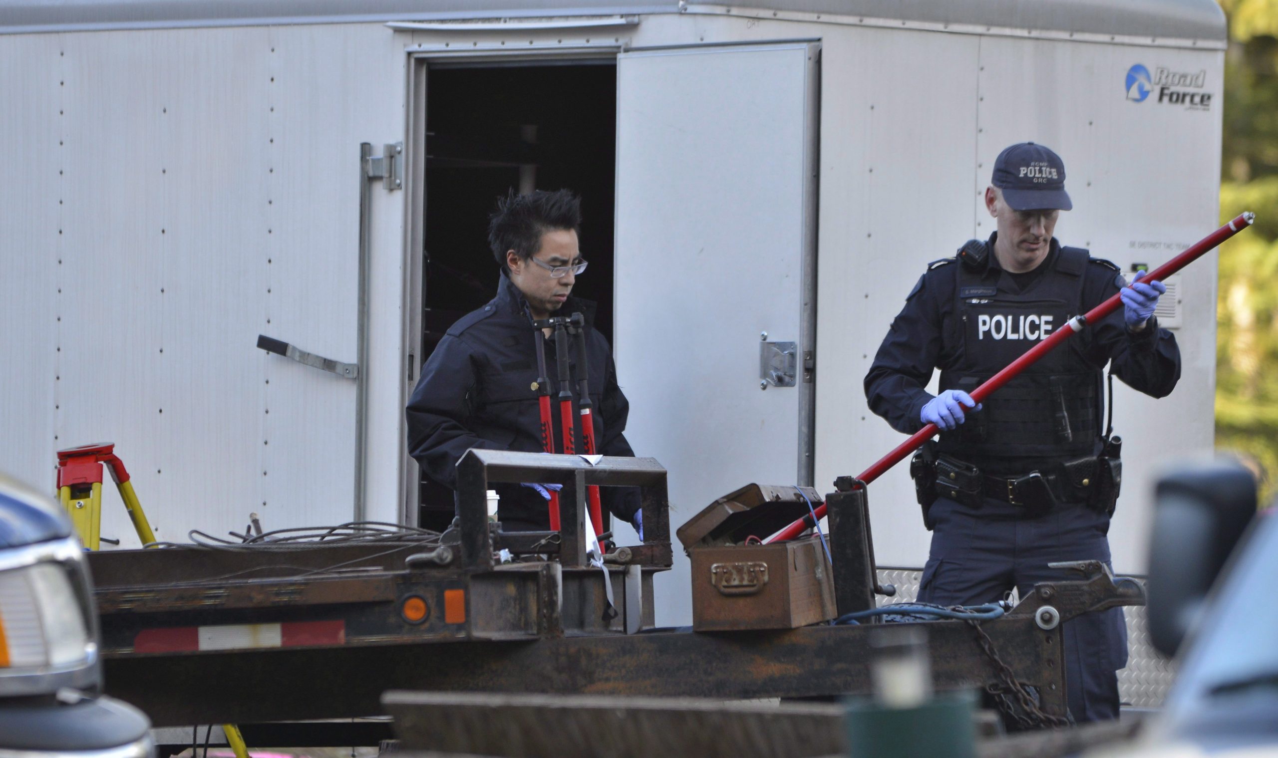 Emergency responders attend to an incident in a B.C. community. THE CANADIAN PRESS