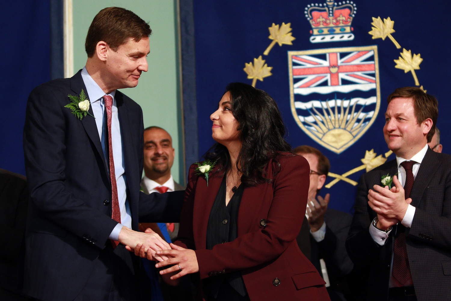 Handshake at the threshold. Premier David Eby congratulates Niki Sharma on her appointment as British Columbia's Attorney General at Government House in Victoria, December 7, 2022. Within two years she would also become Deputy Premier — the province's chief law officer and second-ranking politician, whose most recent pre-politics role had been running oil and gas campaigns for a Pacific coast anti-pipeline organisation. THE CANADIAN PRESS/Chad Hipolito