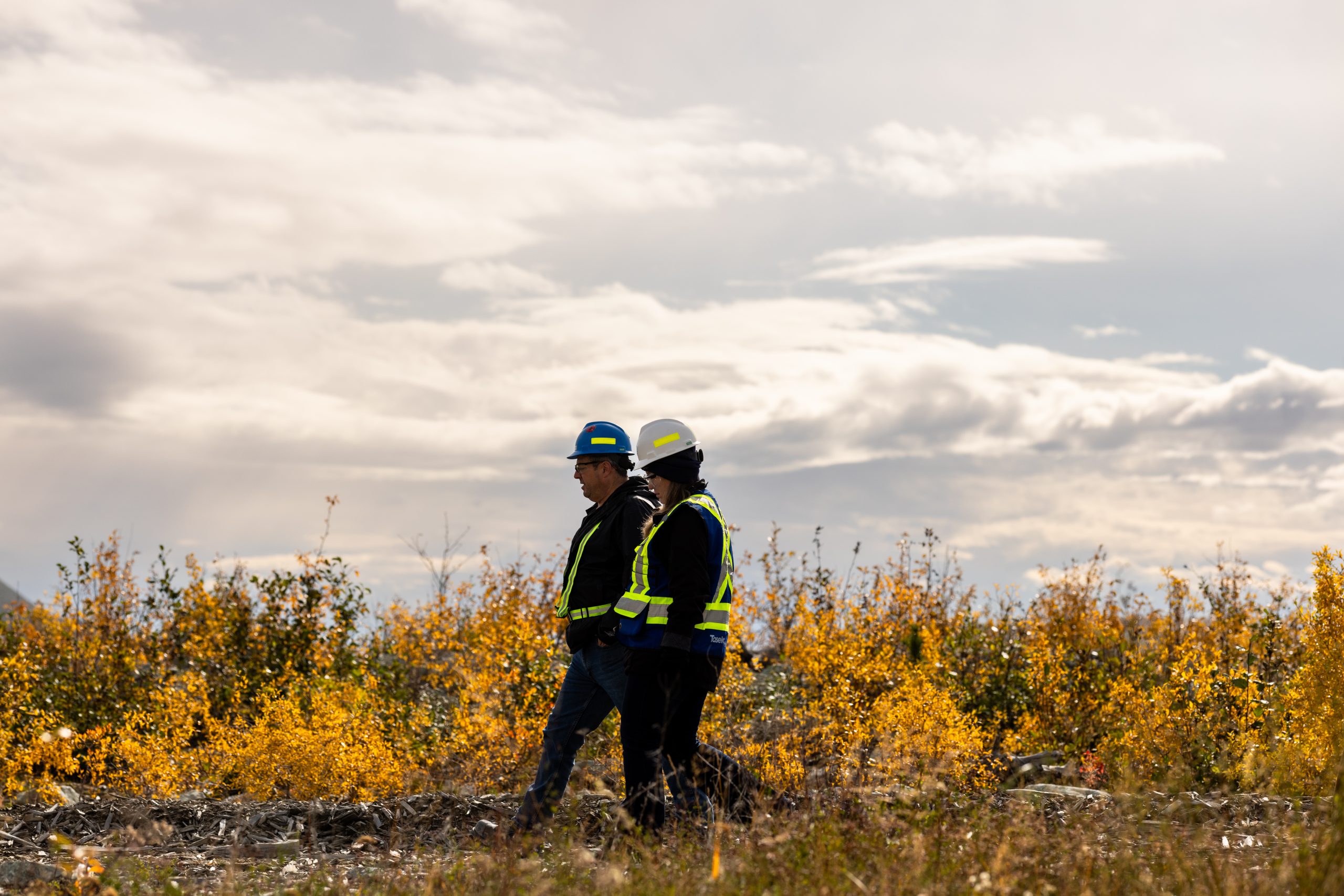 Two workers doing an environmental inspection at the Yellowhead copper mine.